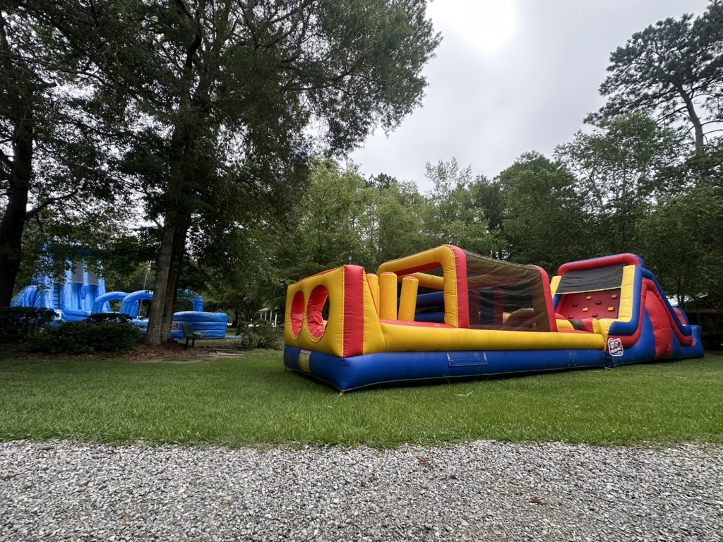 60-foot obstacle course on Christ Episcopal lawn with Pipeline blue water slide in the background